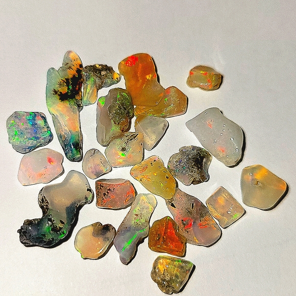 14ctw Natural Black/Blue Ethiopian Opal Polished Rough 4-9mm Grade A 15-30pcs. - Picture 1 of 3